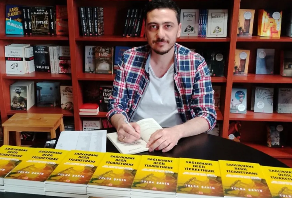  GAZETECİ YAZAR TOLGA ŞAHİN